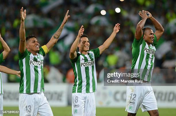 Players of Atletico Nacional celebrate after winning a second leg semi final match between Atletico Nacional and Sao Paulo as part of Copa...