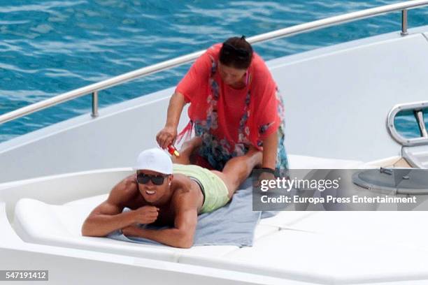 Real Madrid football player Cristiano Ronaldo and his mother Maria Dolores dos Santos Aveiro are seen on July 13, 2016 in Ibiza, Spain.