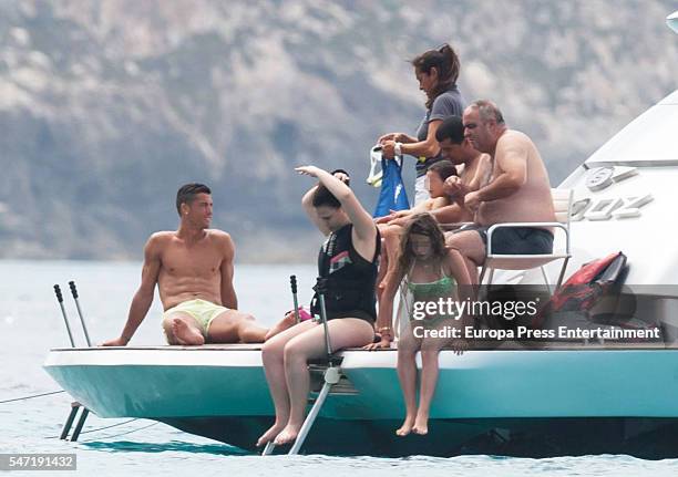 Real Madrid football player Cristiano Ronaldo and his brother Hugo Aveiro are seen on July 13, 2016 in Ibiza, Spain.
