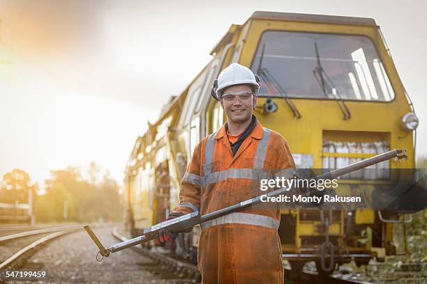 portrait of maintenance apprentice on railway - rail worker stock pictures, royalty-free photos & images