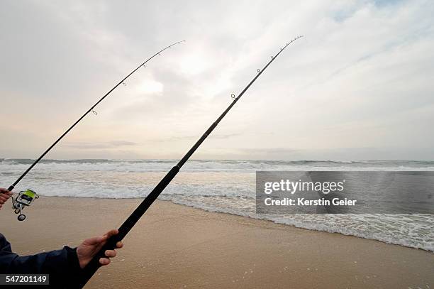Two Fishing Rods And Beach St Lucia Kwazulunatal South Africa High-Res  Stock Photo - Getty Images
