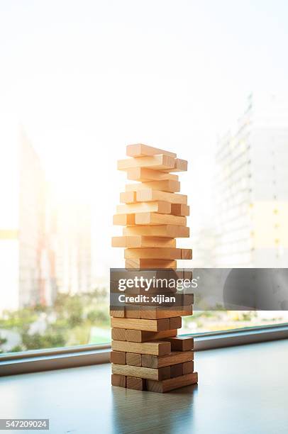Jenga Risk 90 Risk Jenga Stock Photos, High-Res Pictures, and Images - Getty Images