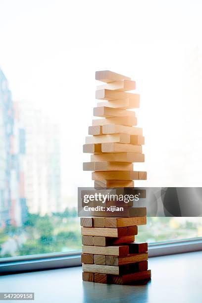 Jenga Risk 90 Risk Jenga Stock Photos, High-Res Pictures, and Images - Getty Images