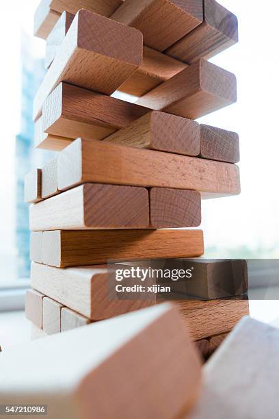 Jenga Risk 120 Risk Jenga Stock Photos, High-Res Pictures, and Images - Getty Images