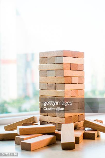Jenga Risk 120 Risk Jenga Stock Photos, High-Res Pictures, and Images - Getty Images