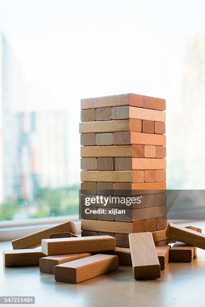 Jenga Risk 120 Risk Jenga Stock Photos, High-Res Pictures, and Images - Getty Images