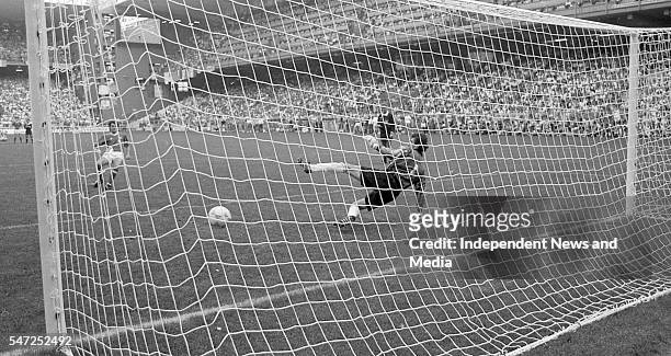 Ray Houghton beats the Romanian goalkeeper Silviu Lung for Ireland's second goal in the penalty shoot-out in Genoa on 25th June 1990. Picture Tom...