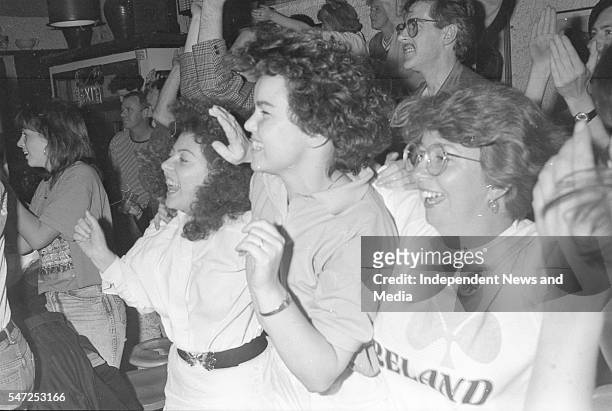 Fans of the Republic of Ireland team watch the match in Mother Redcaps beside Christchurch in Dublin during Italia 90. 22/6/90. .