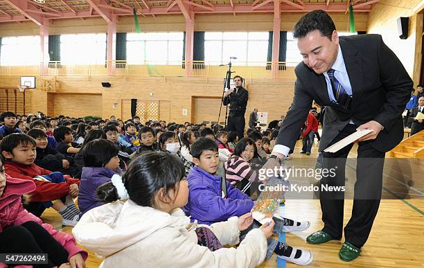 Shichigahama, Japan - Turkish Deputy Prime Minister Ali Babacan on Dec. 7 visits an elementary school in the Miyagi Prefecture town of Shichigahama,...