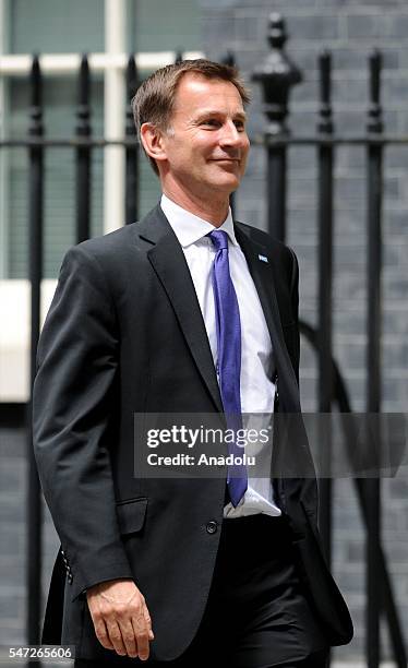 Jeremy Hunt arrives to meet Prime Minister Theresa May where he kept his position as Health Secretary, at Downing Street on July 14, 2016 in London,...