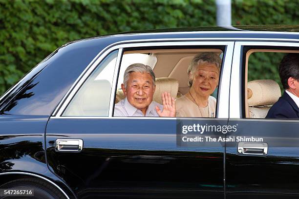 Emperor Akihito and Empress Michiko wave to well-wishers on departure from the Hayama Imperial Villa on July 14, 2016 in Hayama, Kanagawa, Japan. The...