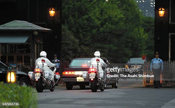 Car carrying Emperor Akihito and Empress Michiko is seen on arrival at the Imperial Palace on July 14, 2016 in Tokyo, Japan. The emperor met 270 VIPs...