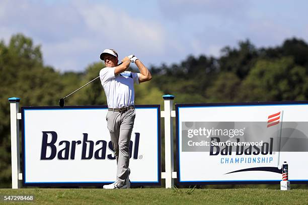 Stuart Appleby of Australia plays a shot off the eighteenth tee during the first round of the Barbasol Championship at the Robert Trent Jones Golf...