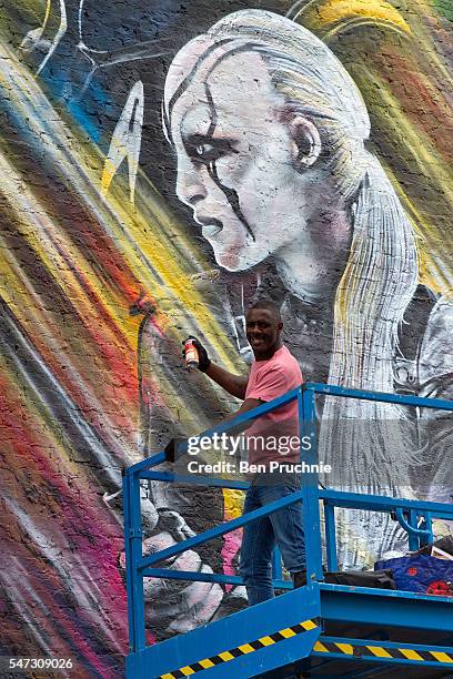 Idris Elba visits a street art mural promoting Star Trek Beyond in East London on July 14, 2016 in London, England.