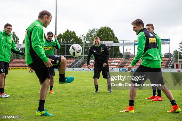 Director of Sport Max Eberl of Borussia Moenchengladbach have fun with Andreas Christensen, Lars Stindl, Oscar Wendt, Andre Hahn and Jonas Hofmann...
