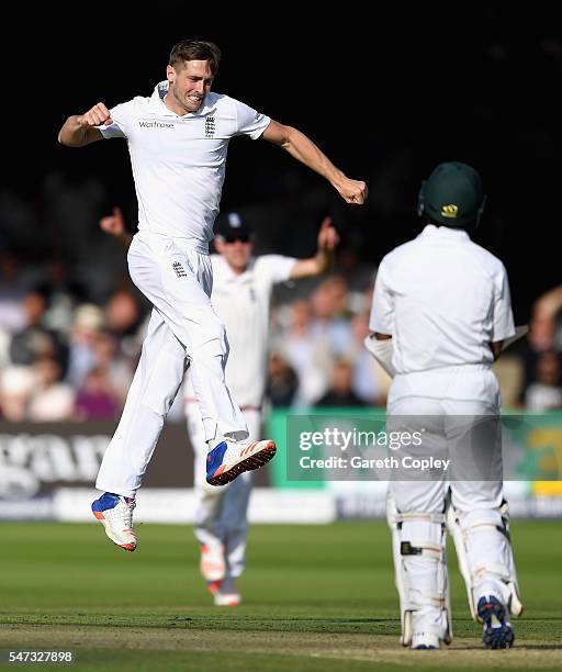 Chris Woakes of England celebrates dismissing Asad Shafiq of Pakistan during the 1st Investec Test between England and Pakistan at Lord's Cricket...