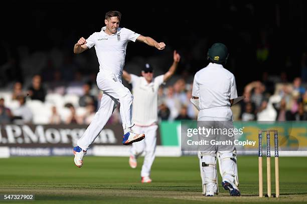 Chris Woakes of England celebrates dismissing Asad Shafiq of Pakistan during the 1st Investec Test between England and Pakistan at Lord's Cricket...