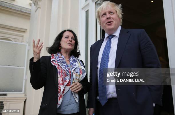 British Foreign Secretary Boris Johnson talks with French Ambassador to Britain, Sylvie Bermann as he attends a reception at the French Ambassador's...