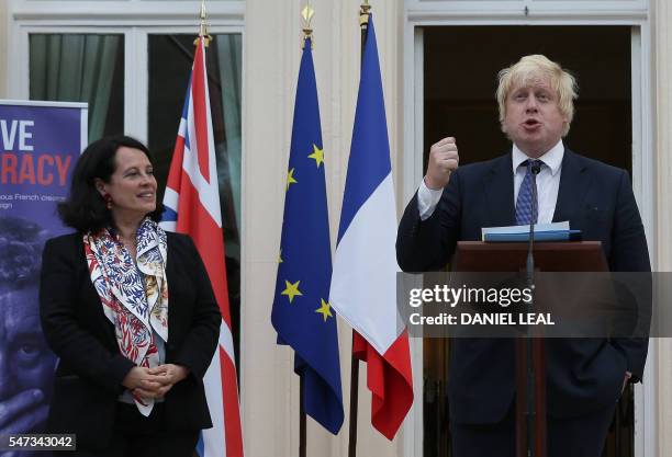 French Ambassador to Britain, Sylvie Bermann listens as British Foreign Secretary Boris Johnson speaks as he attends during a reception at the French...