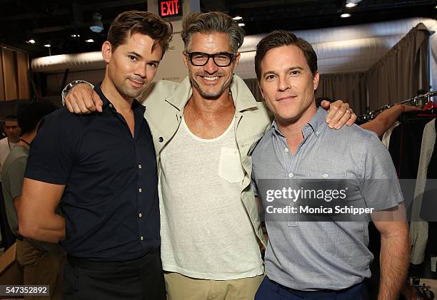 Actor Andrew Rannells, model and CFDA ambassador for NYFWM Eric Rutherford and actor Michael Doyle pose for a photo backstage after the Todd Snyder...