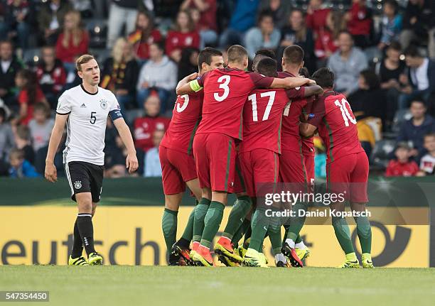 Goncalo Rodrigues of Portugal celebrates his team's second goal with team mates during the UEFA Under19 European Championship match between U19...