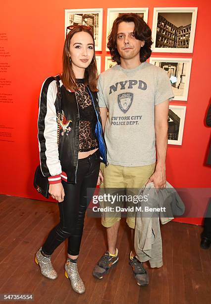 Sarah Stanbury and Fenton Bailey attend a private view of 'Terence Donovan: Speed Of Light' at The Photographers' Gallery on July 14, 2016 in London,...