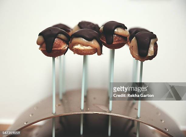 batch of salted caramel cake pops - rekha garton stock pictures, royalty-free photos & images