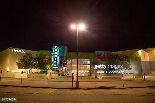 Carmike Cinemas Inc. Theater stands in Peoria, Illinois, U.S., on Monday, July 11, 2016. AMC Entertainment Holdings Inc.s $1.2 billion purchase of...