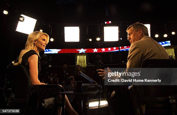 Fox News broadcasters Megyn Kelly and Brit Hume discuss the first Republican Party presidential debate in Cleveland, Ohio, August 6, 2015.