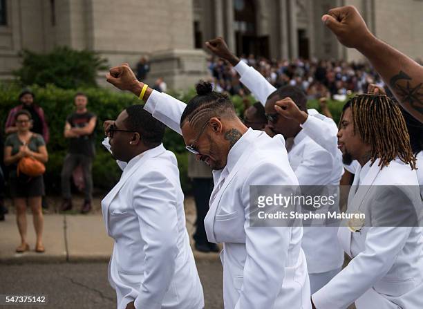 Pallbearers lead a march down Selby Avenue after the funeral of Philando Castile at the Cathedral of St. Paul on July 14, 2016 in St. Paul,...