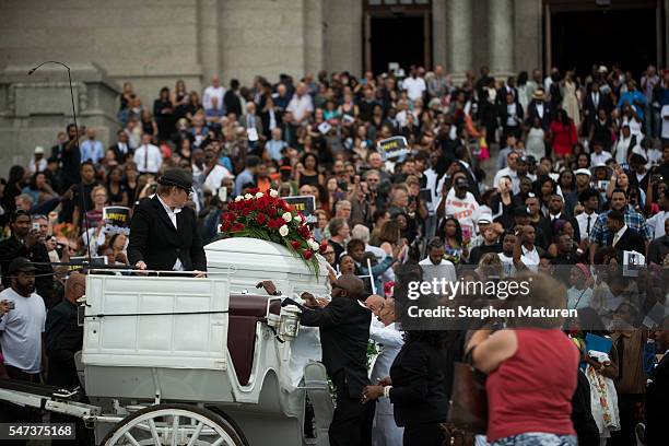 The casket carrying Philando Castile is loaded into a horse drawn carriage at the Cathedral of St. Paul on July 14, 2016 in St. Paul, Minnesota....