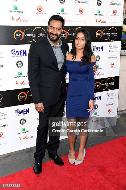 Ajay and Nysa Devgn arrive at the opening night of the London Indian Film Festival at Cineworld Cinemas on July 14, 2016 in London, England.