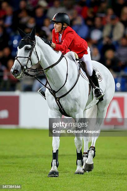 Meredith Michaels-Beerbaum of Germany rides on Fibonacci 17 and celebrates her second ride during the Mercedes Benz Nations Cup of CHIO Aachen 2016...