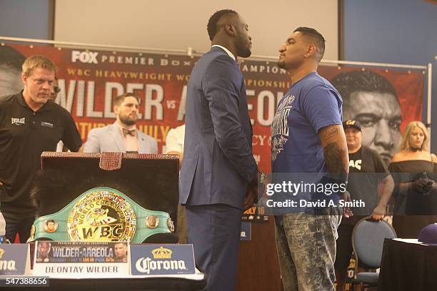 World Heavyweight Champion Deontay Wilder and Chris Arreola face off during a press conference at the Birmingham-Jefferson Civic Center on July 14,...