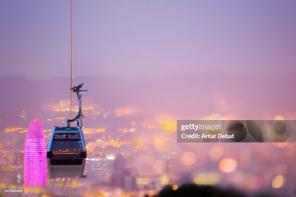 Barcelona pink cityscape at night with bokeh.