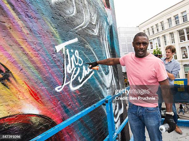 Idris Elba visits a street art mural promoting Star Trek Beyond in East London on July 14, 2016 in London, England.