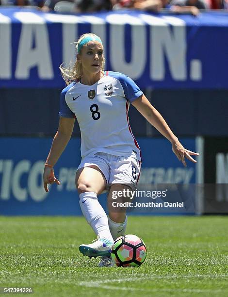 Julie Johnston of the United States passes against South Africa at Soldier Field on July 9, 2016 in Chicago, Illinois. The United States defeated...