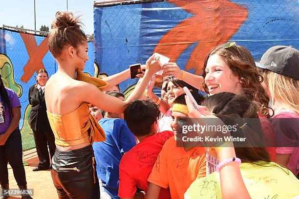 Actress Zendaya signs autographs during the Nickelodeon Kids' Choice Sports Awards 2016 at UCLA's Pauley Pavilion on July 14, 2016 in Westwood,...