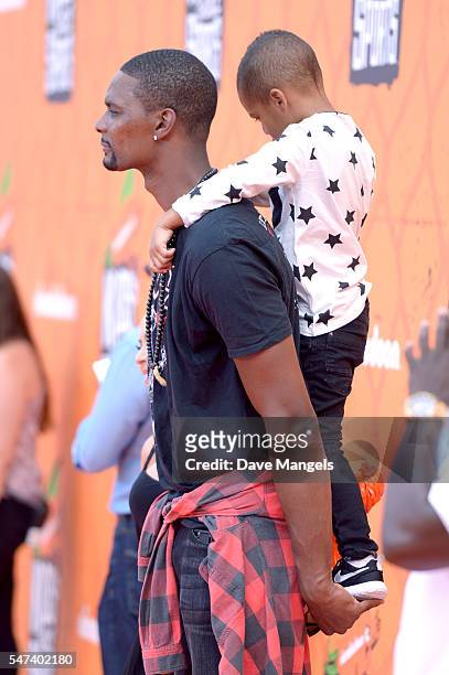Player Chris Bosh and son attend the Nickelodeon Kids' Choice Sports Awards 2016 at UCLA's Pauley Pavilion on July 14, 2016 in Westwood, California.