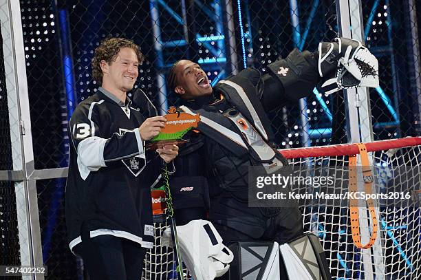 Player Tyler Toffoli and tv personality Nick Cannon speak onstage during the Nickelodeon Kids' Choice Sports Awards 2016 at UCLA's Pauley Pavilion on...