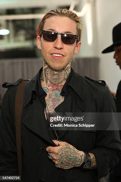 Chris Lavish poses for a photo backstage before the General Idea fashion show during New York Fashion Week: Men's S/S 2017 at Skylight Clarkson Sq on...