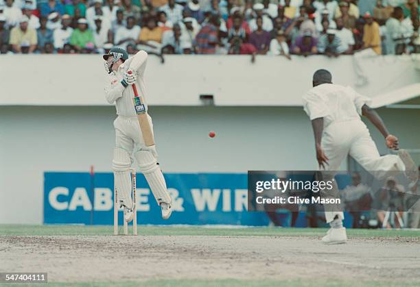 Australian cricketer Steve Waugh defends a bouncer during the 4th Test Match between the West Indies and Australia in Jamaica, May 1995.