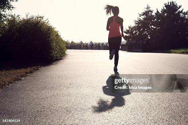 Two Shadow Running Woman Shadow Running Photos and Premium High Res Pictures - Getty Images