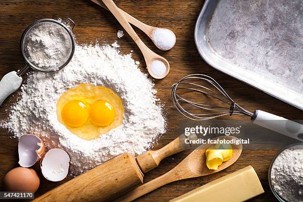 preparing dough for baking - ingredient imagens e fotografias de stock