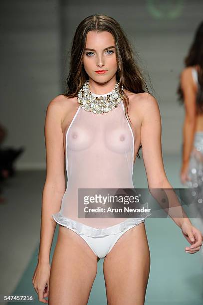 Models walk the runway at Cirone Swim Runway Show during Art Hearts Fashion Miami Swim Week Presented by AIDS Healthcare Foundation at Collins Park...