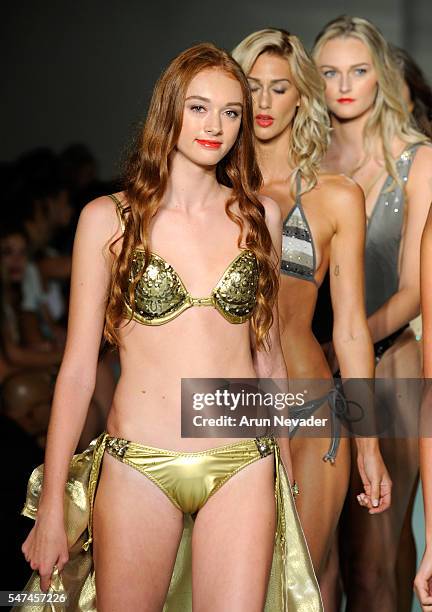 Models walk the runway at Cirone Swim Runway Show during Art Hearts Fashion Miami Swim Week Presented by AIDS Healthcare Foundation at Collins Park...