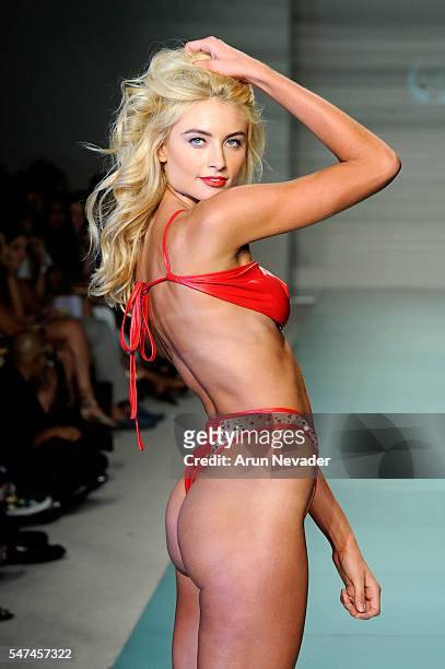 Models walk the runway at Cirone Swim Runway Show during Art Hearts Fashion Miami Swim Week Presented by AIDS Healthcare Foundation at Collins Park...