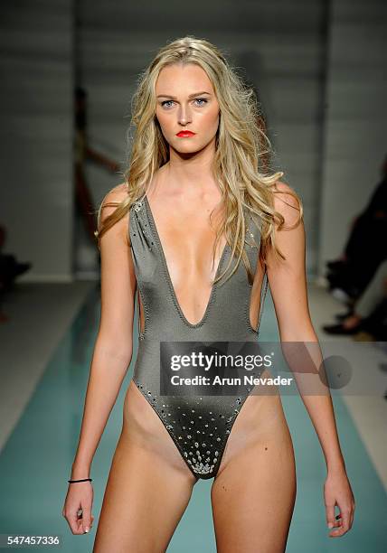 Models walk the runway at Cirone Swim Runway Show during Art Hearts Fashion Miami Swim Week Presented by AIDS Healthcare Foundation at Collins Park...