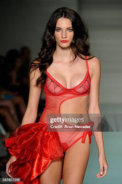 Models walk the runway at Cirone Swim Runway Show during Art Hearts Fashion Miami Swim Week Presented by AIDS Healthcare Foundation at Collins Park...