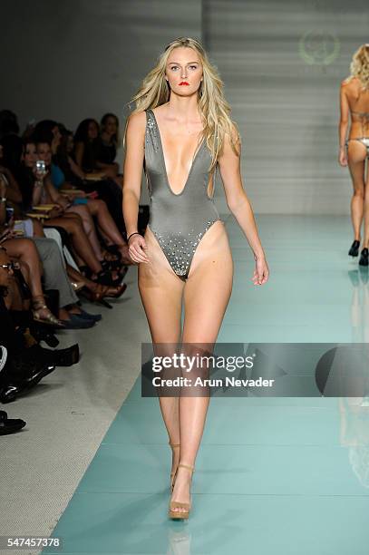 Models walk the runway at Cirone Swim Runway Show during Art Hearts Fashion Miami Swim Week Presented by AIDS Healthcare Foundation at Collins Park...